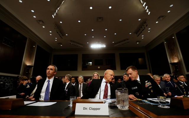 U.S. Defense Under Secretary for Intelligence Marcel Lettre, Director of National Intelligence James Clapper, and National Security Agency Director U.S. Navy Admiral Michael Rogers testify before a Senate Armed Services Committee hearing on foreign cyber threats.