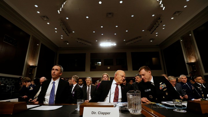 U.S. Defense Under Secretary for Intelligence Marcel Lettre, Director of National Intelligence James Clapper, and National Security Agency Director U.S. Navy Admiral Michael Rogers testify before a Senate Armed Services Committee hearing on foreign cyber threats.