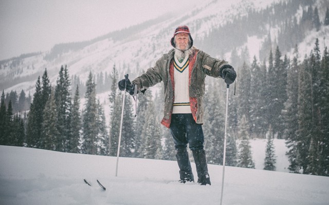 Billy Barr stands in the snow at his home below Gothic Mountain