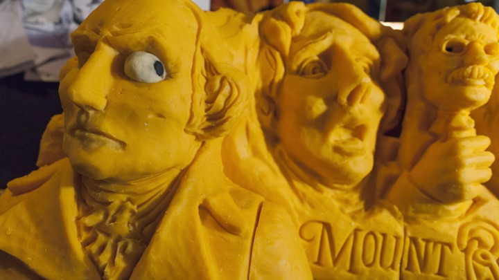 A 160-pound cheddar cheese sculpture of Mount Rushmore, created in 2013