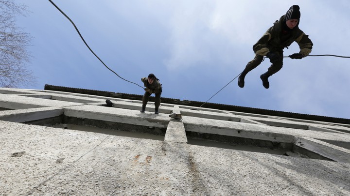 Members of Pokrov youth military club take part in training in 2016.