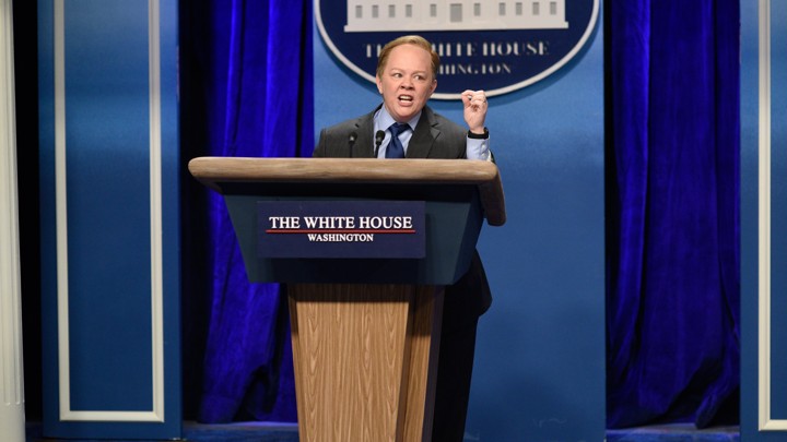 Melissa McCarthy as the White House Press Secretary Sean Spicer