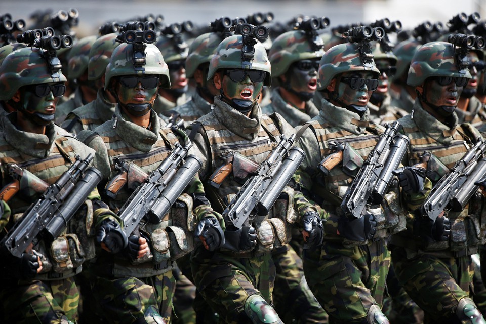 North Korean special forces soldiers march and shout slogans during a military parade marking the 105th birth anniversary of country's founding father, Kim Il Sung in Pyongyang, North Korea, on April 15, 2017.