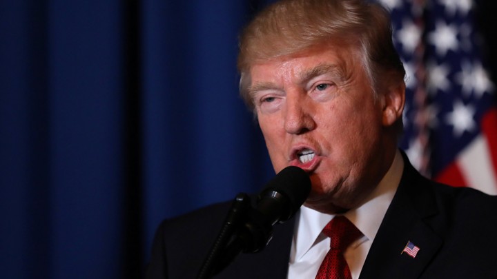President Donald Trump arrives to deliver a statement about missile strikes on a Syrian airfield.