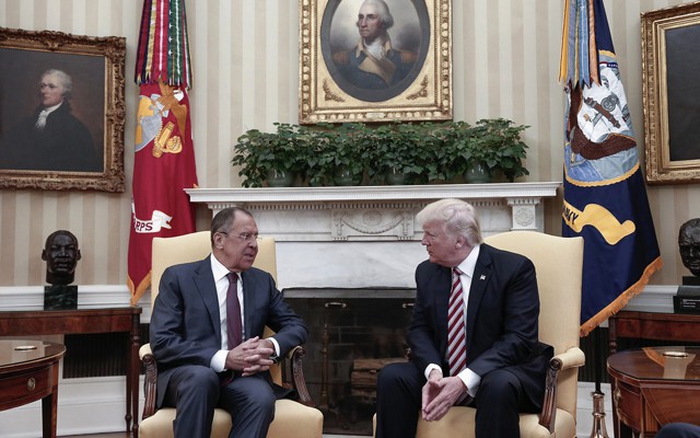 Russian Foreign Minister Sergei Lavrov and President Trump chat in the Oval Office on Wednesday.
