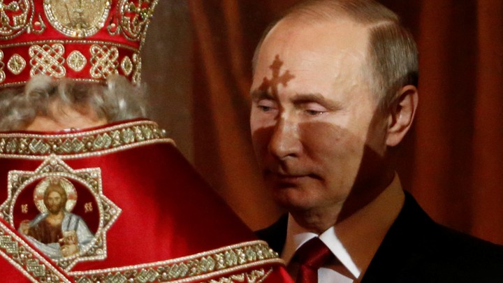 Russian President Vladimir Putin attends the Orthodox Easter service at the Christ the Savior Cathedral in Moscow, Russia, on April 16, 2017.