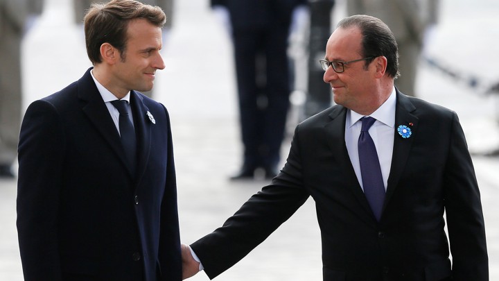 President-elect Emmanuel Macron and outgoing President François Hollande mark the anniversary of Nazi Germany’s defeat in World War II at the Arc de Triomphe in Paris on May 8, 2017.