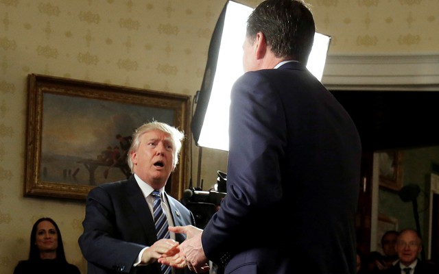 President Trump greets FBI Director James Comey at a January 22 reception.