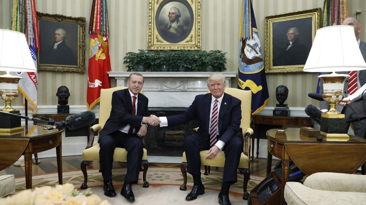 Turkey's President Recep Tayyip Erdogan shakes hands with President Trump in the Oval Office on May 16, 2017.