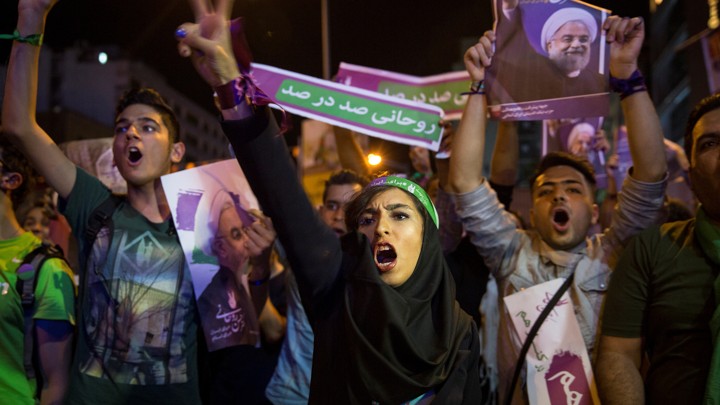 Supporters of Iran's President Hassan Rouhani take part in a campaign rally in Tehran, Iran, on May 17, 2017.