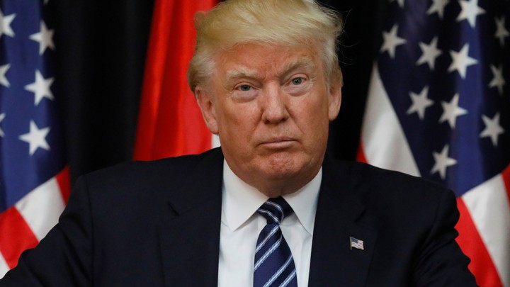 Trump pauses during his comments about the attack in Manchester, England.