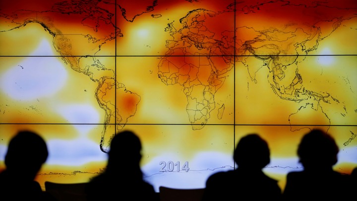 A screen showing a world map with climate anomalies during the World Climate Change Conference 2015 (COP21) at Le Bourget, near Paris, on December 8, 2015