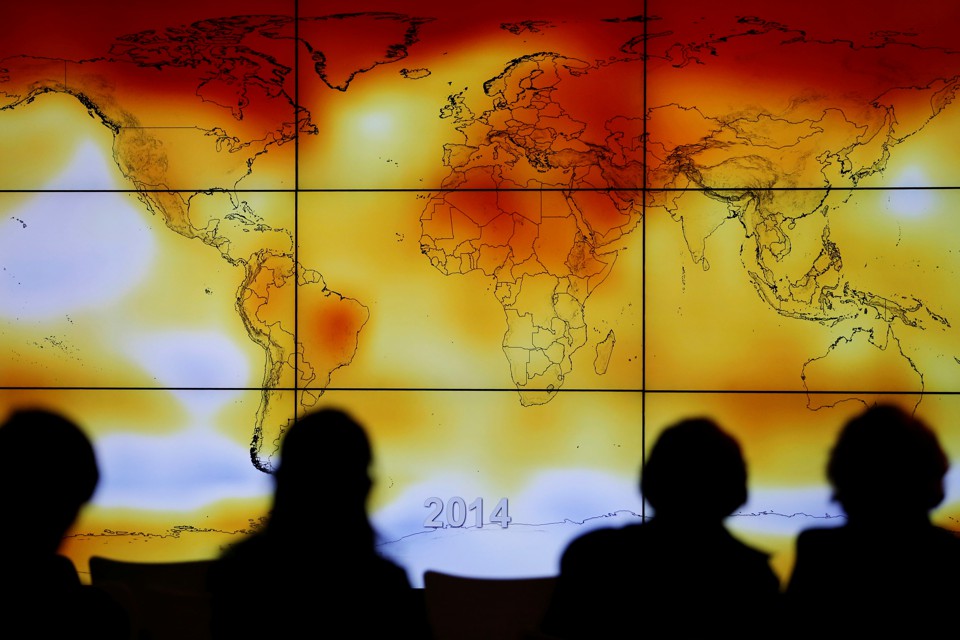 A screen showing a world map with climate anomalies during the World Climate Change Conference 2015 (COP21) at Le Bourget, near Paris, on December 8, 2015