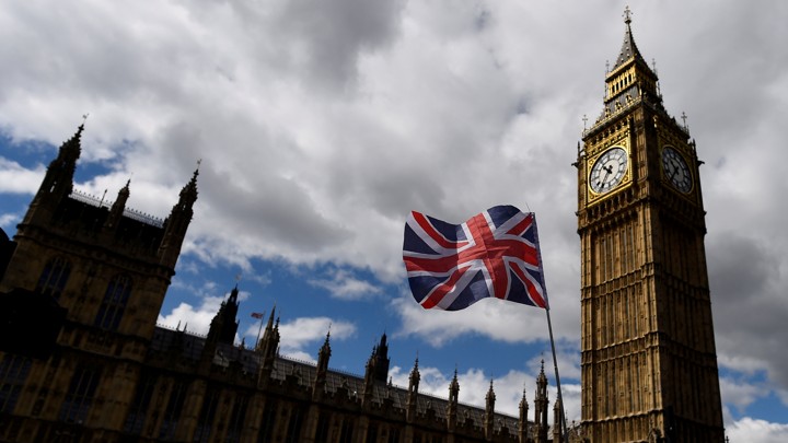 The Union Flag flies near the Houses of Parliament in London