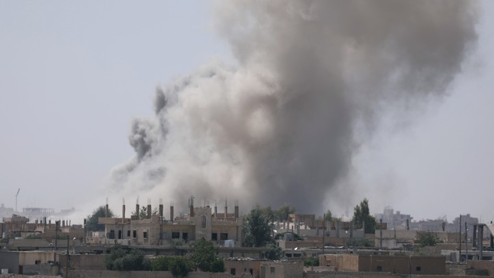 Smoke rises from the al-Mishlab district at Raqqa's southeastern outskirts.
