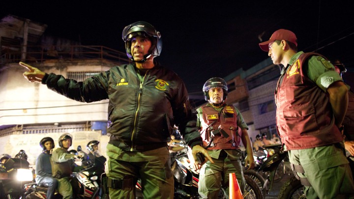 Benavides gives instructions to soldiers during a security operation initiative in 2013.