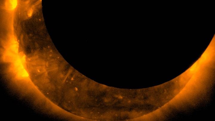 The view of a 2012 solar eclipse from the Hinode spacecraft