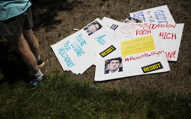 Anti-Paul Ryan signs lay on the ground during a protest in Georgia in May.