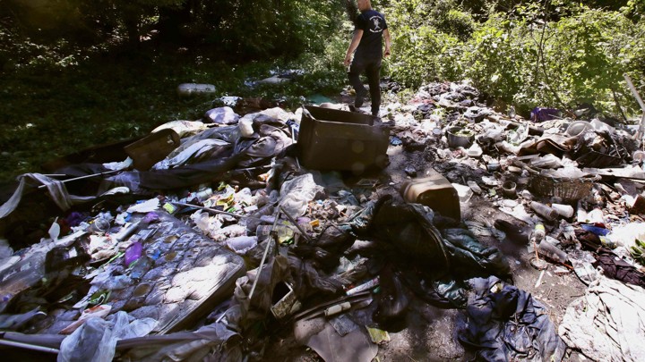 Heroin needles are shown in Lowell, Massachusetts, in June