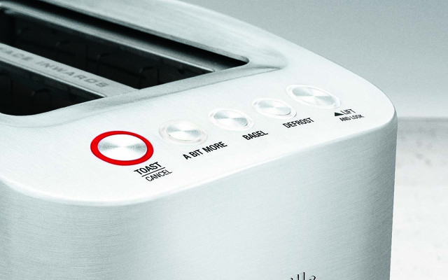 A Breville toaster with the "A Bit More" button