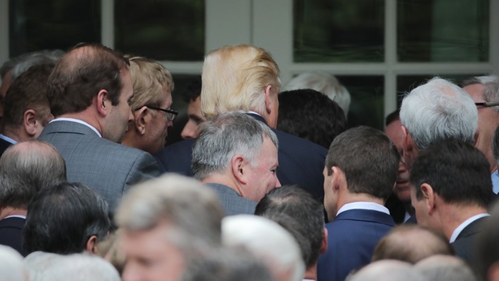 U.S. President Donald Trump departs after gathering with Congressional Republicans in the Rose Garden of the White House.