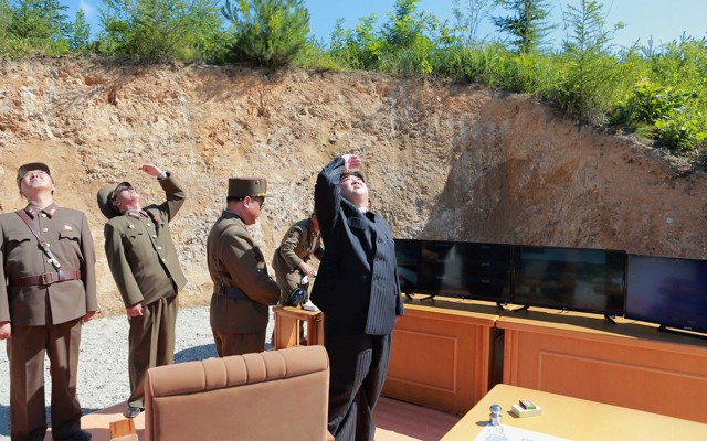 North Korean leader Kim Jong Un looks on during the test-launch of the intercontinental ballistic missile Hwasong-14 in an undated photo released by North Korea's Korean Central News Agency (KCNA).