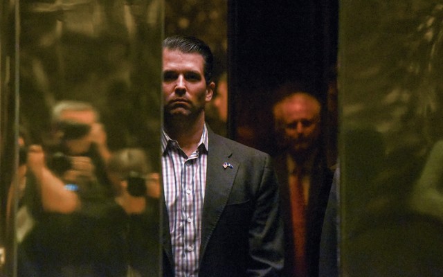 Donald Trump Jr. boards an elevator at Trump Tower