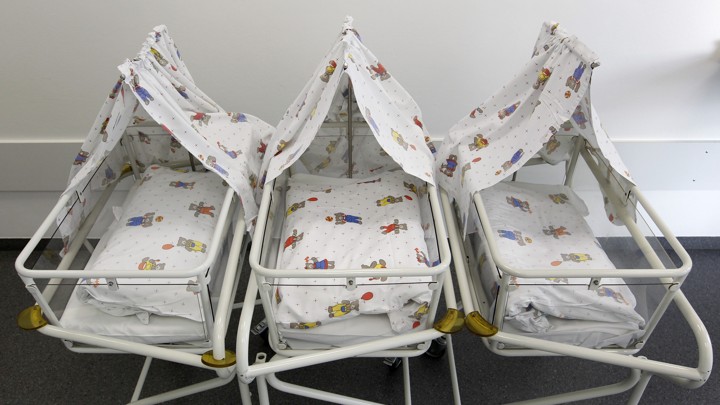Empty cots are lined up for newborns at a Munich hospital in 2011.