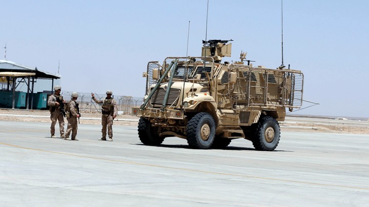 U.S. Marine troops talk to each other at Camp Bastion in Helmand province, Afghanistan on July 4, 2017.