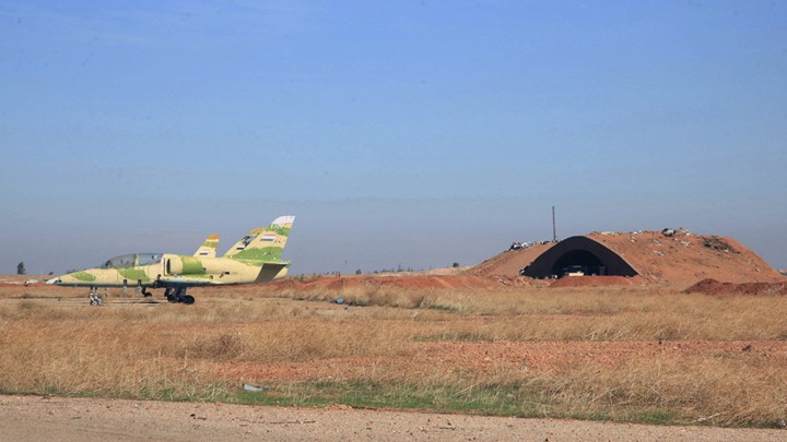 Warplanes inside the Kweiras air base, east of Aleppo, Syria.