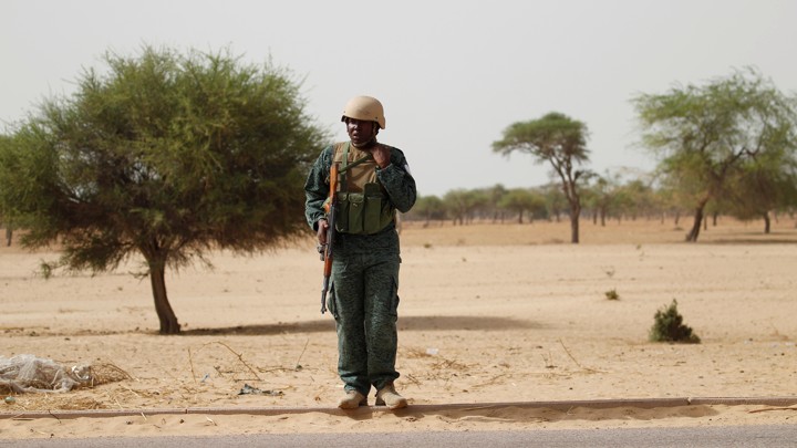 A Nigerian soldier stands guard following attacks by Boko Haram in June 2016.