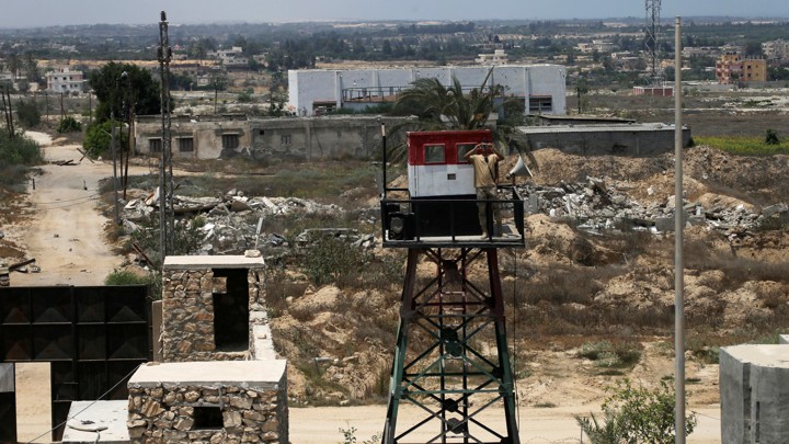 An Egyptian soldier guards the Egyptian side of the border between Egypt and the southern Gaza Strip on July 5, 2017.