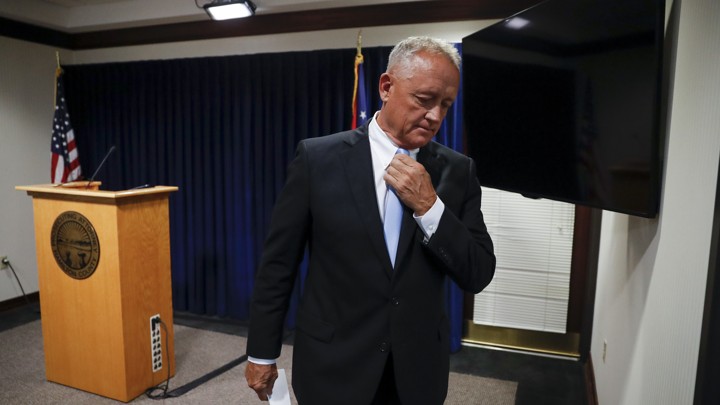 Hamilton County Prosecutor Joe Deters leaves after announcing his decision to not pursue a third trial on July 18, 2017.
