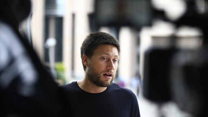 Amnesty International's Turkey researcher talks to reporters outside Istanbul's court on July 17, 2017.
