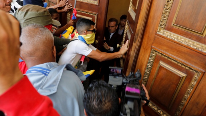 Government supporters try to enter Venezuela's opposition-controlled National Assembly on July 5, 2017.
