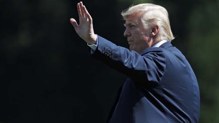 President Trump waves to the camera.
