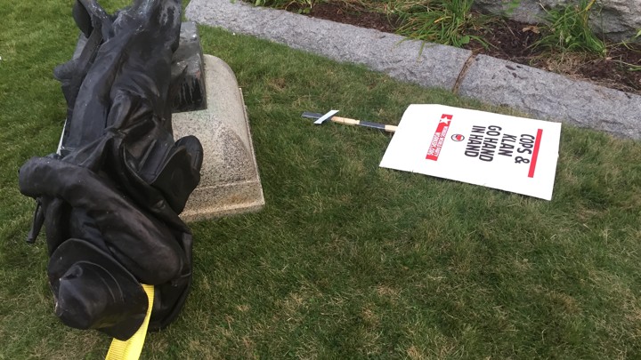 A Confederate statue in Durham, North Carolina, is taken down by protesters.