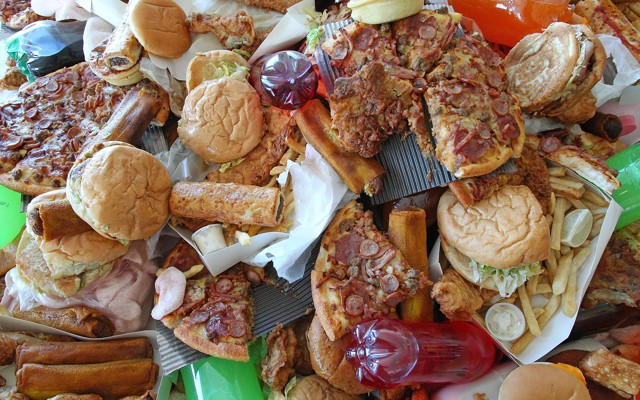 A large pile of unhealthy foods