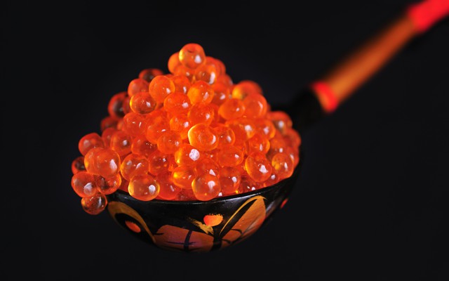 A spoonful of red caviar