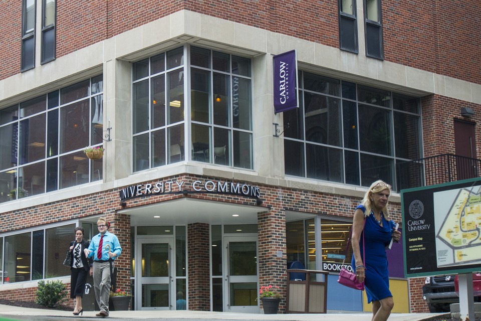 A building on the Carlow University campus with a sign that reads University Commons. 