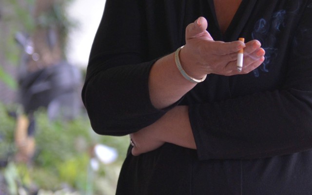 A woman smokes in West Virginia.