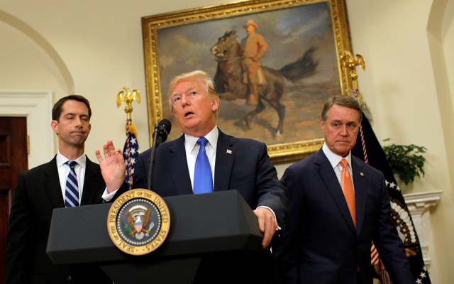 President Trump, Senator Tom Cotton, and Senator David Perdue at an announcement