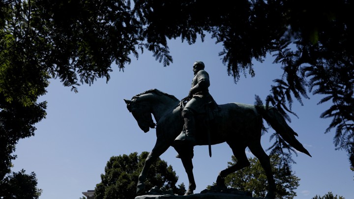 The statue of Confederate General Robert E. Lee sits at the center of the park formerly dedicated to him, the site of recent violent demonstrations in Charlottesville, Virginia.
