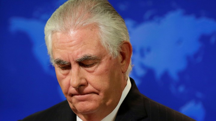 Rex Tillerson looks down