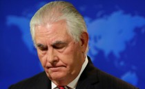 Rex Tillerson looks down
