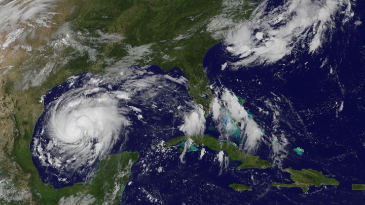 In a satellite image, Harvey approaches the Texas Gulf Coast as a tropical storm.