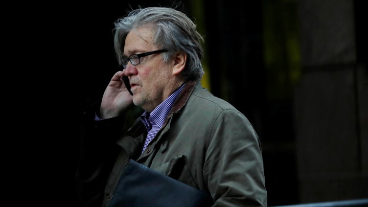 Steven Bannon talks on a cellphone.