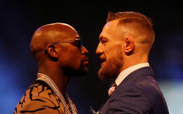 Floyd Mayweather and Conor McGregor appear in a press conference in London.