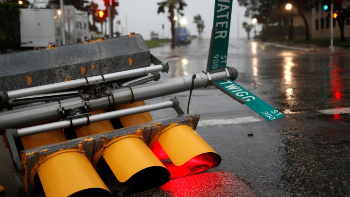Traffic lights in Corpus Christi, Texas, are knocked down as Hurricane Harvey approaches.