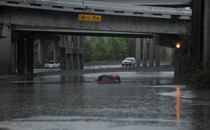 An abandoned Hummer is covered in floodwaters on Interstate 610 after Hurricane Harvey inundated the Texas Gulf coast with rain.
